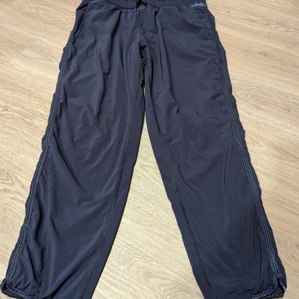 Lululemon size 10; navy satin trim lined 7/8 length joggers